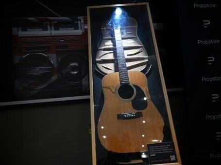 Oasis guitars among music memorabilia worth £3 mn at UK auction